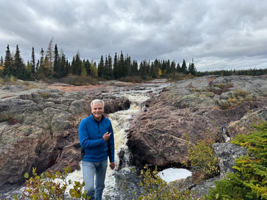 White Water Falls in Mary’s Harbour (note how helpfully I point at the cascade)
